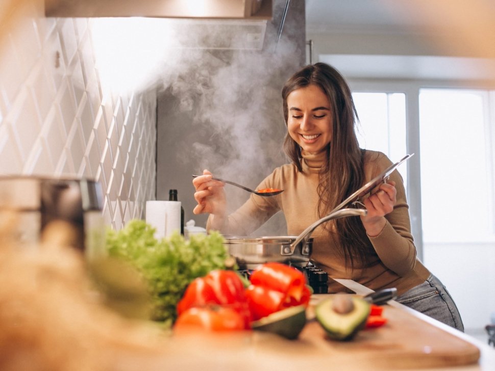 Woman cooking at kitchen
