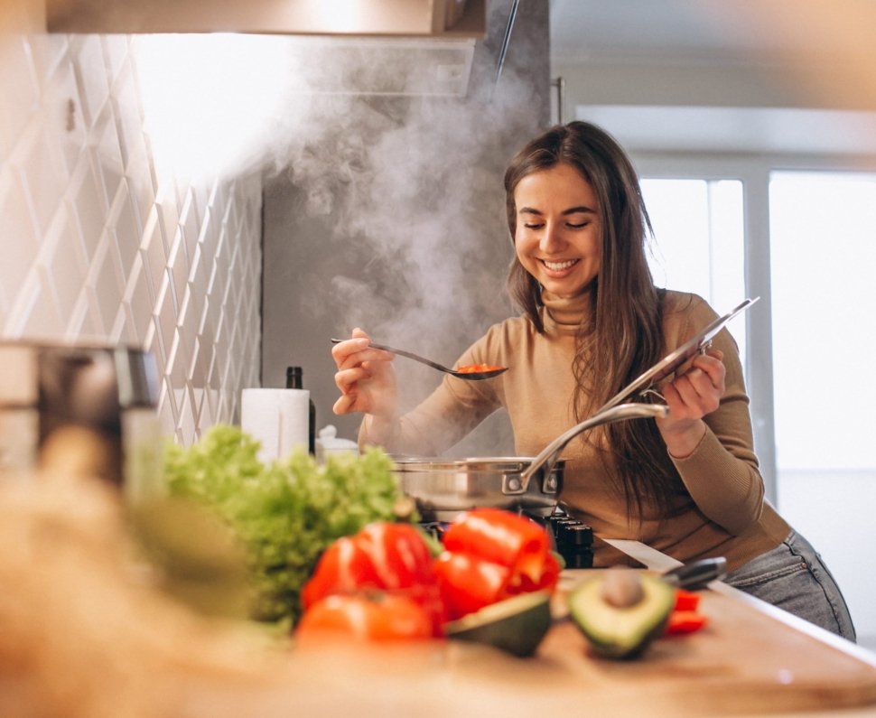 Woman cooking at kitchen